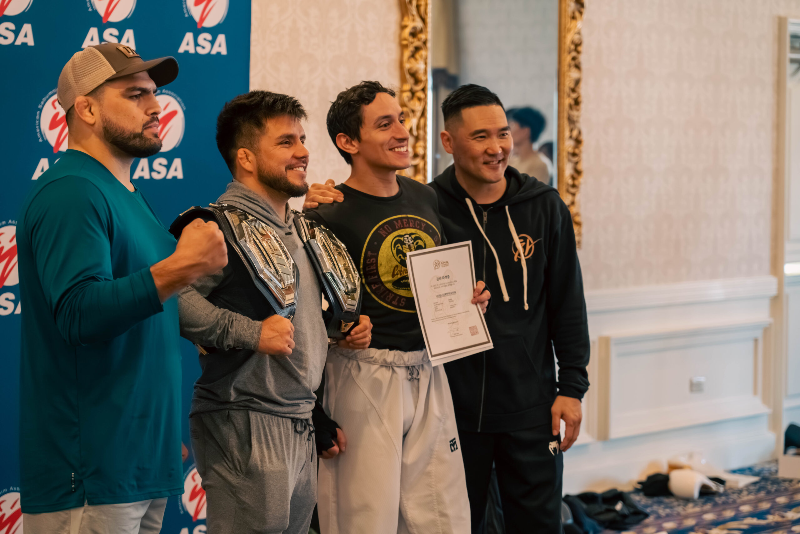 Coach Eddie Cha with UFC fighters at a certification seminar